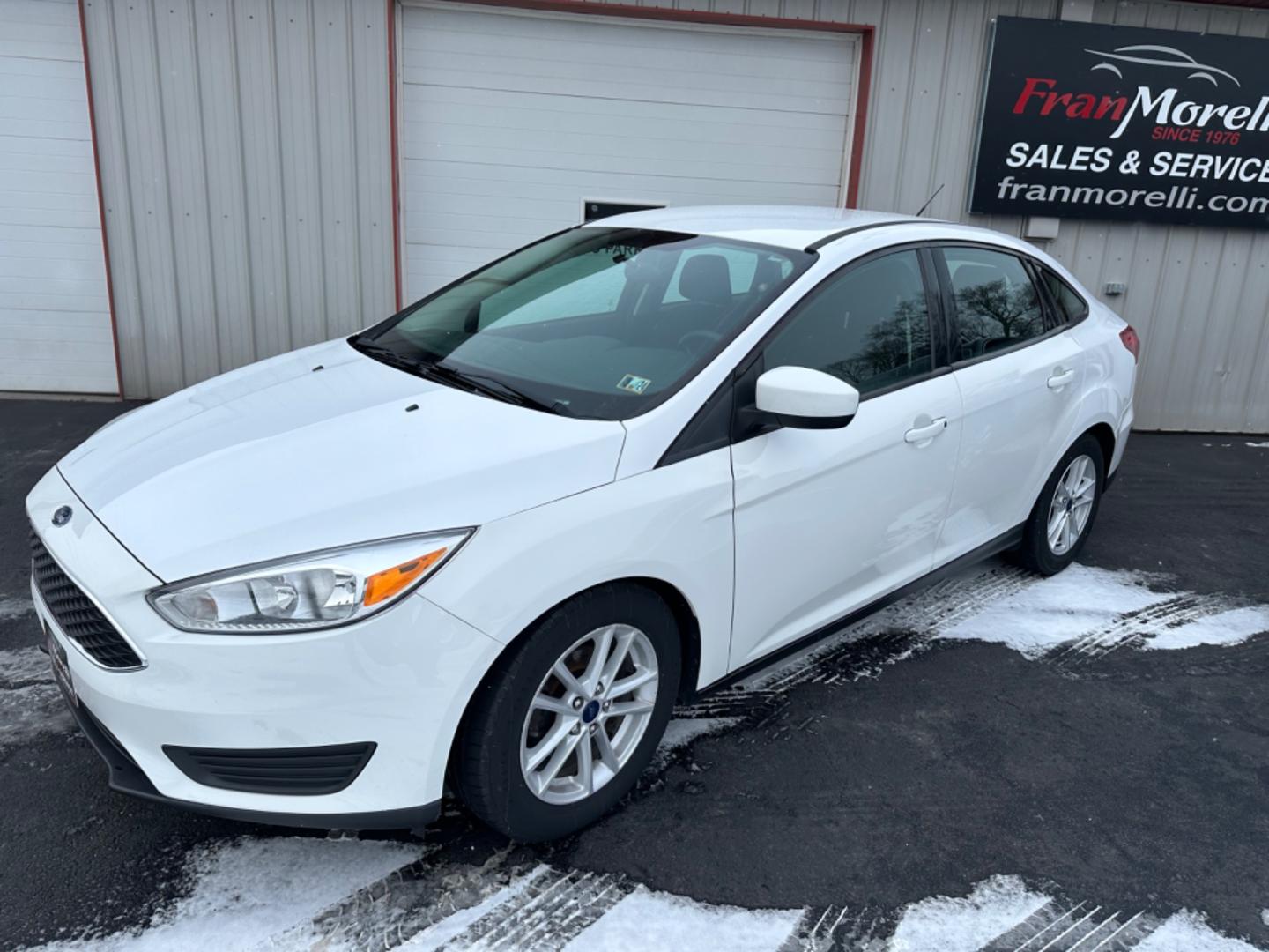 2018 White Ford Focus SE Sedan (1FADP3F20JL) with an 2.0L L4 DOHC 16V engine, Auto transmission, located at 8464 Route 219, Brockway, PA, 15824, (814) 265-1330, 41.226871, -78.780518 - Clean, well taken care of Ford Focus Se Sedan with 4 cylinder engine, air condition, power windows and locks, factory alloys and only 71000 miles. This pre owned car has been serviced, Pa-Inspected, and comes with warranty. Stop in or call one of the Morelli boys today to see this car which is pric - Photo#0